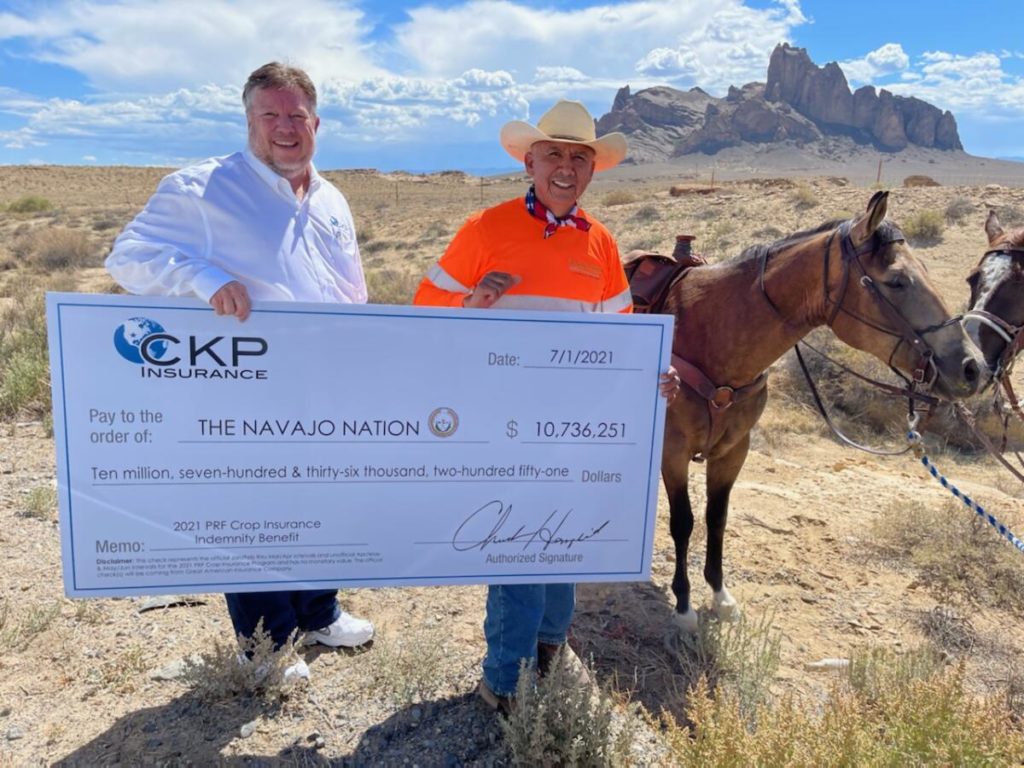 Chuck Hemphill of CKP Insurance and Chairman, Rick Nez with 10.7 Million Dollar Check